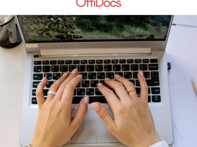 Hands typing on a laptop while opening a DOCX file without Microsoft Word using OffiDocs online document editor