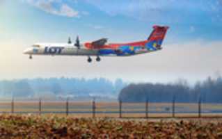 Free download 30.12.2017 / SP-EQH / Eurolot / Bombardier Dash 8 Q400 / landing at Ljubljana airport free photo or picture to be edited with GIMP online image editor