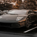 A Black Sports Car Parked on the Road  screen for extension Chrome web store in OffiDocs Chromium