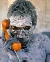 Free download Aboriginal Australian Using A Telephone free photo or picture to be edited with GIMP online image editor