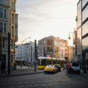 A city street with a yellow bus and cars  screen for extension Chrome web store in OffiDocs Chromium