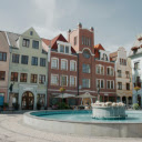 A fountain in the middle of a city square  screen for extension Chrome web store in OffiDocs Chromium