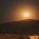 A Full Moon over a Cityscape  screen for extension Chrome web store in OffiDocs Chromium