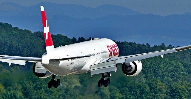 Gratis download Vliegtuigen Boeing 777-300 Hb-Jnj - gratis foto of afbeelding om te bewerken met GIMP online afbeeldingseditor