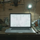 A Laptop on a Work Table  screen for extension Chrome web store in OffiDocs Chromium