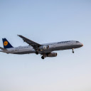 A large passenger jet flying through the sky  screen for extension Chrome web store in OffiDocs Chromium