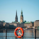 A life preserver on a pier in front of a church  screen for extension Chrome web store in OffiDocs Chromium