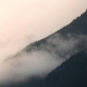 A mountain range with clouds and fog  screen for extension Chrome web store in OffiDocs Chromium