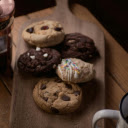 An Assortment of Cookies on a Wooden Chopping Board  screen for extension Chrome web store in OffiDocs Chromium