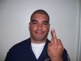 Free download Andrews International Security Hollywood BID Patrol Officer flipping the bird free photo or picture to be edited with GIMP online image editor