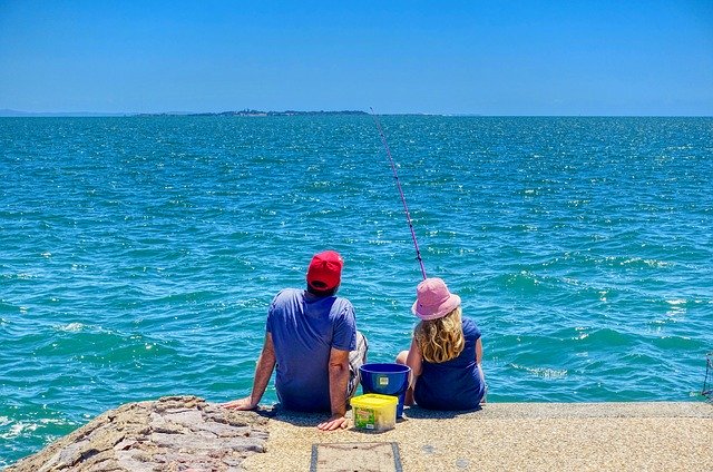 تنزيل Angler Fishing Couple - صورة مجانية أو صورة لتحريرها باستخدام محرر الصور عبر الإنترنت GIMP