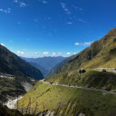 A Scenic Mountain Landscape under a Clear Blue Sky  screen for extension Chrome web store in OffiDocs Chromium