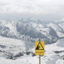 A sign on a snow covered mountain  screen for extension Chrome web store in OffiDocs Chromium