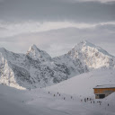 A snowy mountain with a cabin in the middle  screen for extension Chrome web store in OffiDocs Chromium