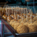 Assorted Caramel and Nut Covered Apples on Display  screen for extension Chrome web store in OffiDocs Chromium