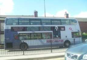Free download Atomic Blonde (2017) uk bus advertising  free photo or picture to be edited with GIMP online image editor