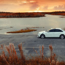 Audi Sedan at Sunset Waterside  screen for extension Chrome web store in OffiDocs Chromium