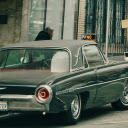 A Vintage Ford Thunderbird Parked by the Roadside  screen for extension Chrome web store in OffiDocs Chromium