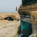A Woman Standing on a Cliff in Sidari, Corfu  screen for extension Chrome web store in OffiDocs Chromium