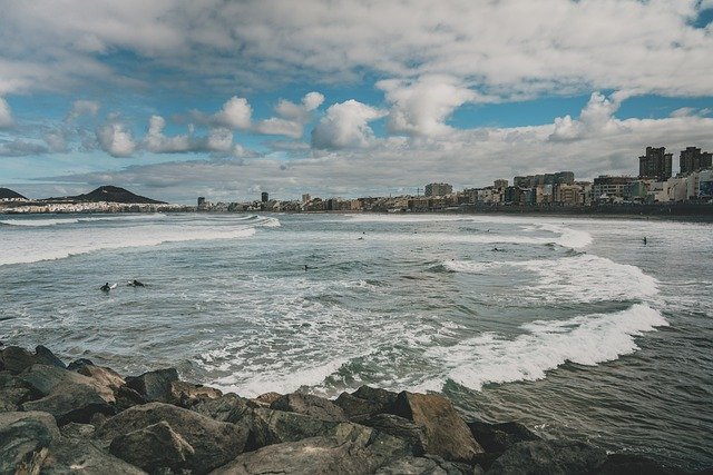 Безкоштовно завантажте пляж пісок океан хвилі скелі безкоштовне зображення для редагування за допомогою безкоштовного онлайн-редактора зображень GIMP