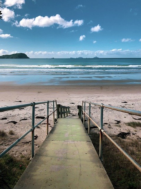 Бесплатно скачать Beach Sand Surf Low - бесплатную фотографию или картинку для редактирования с помощью онлайн-редактора изображений GIMP