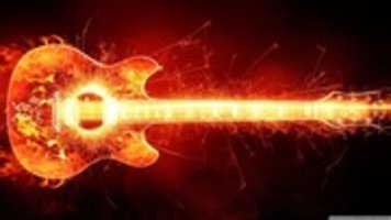 Free download blazing_guitar-wallpaper-1366x768 free photo or picture to be edited with GIMP online image editor