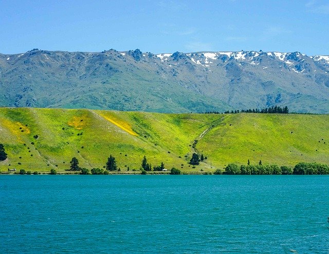 Muat turun percuma Blue Lake Layer Mountains - foto atau gambar percuma untuk diedit dengan editor imej dalam talian GIMP