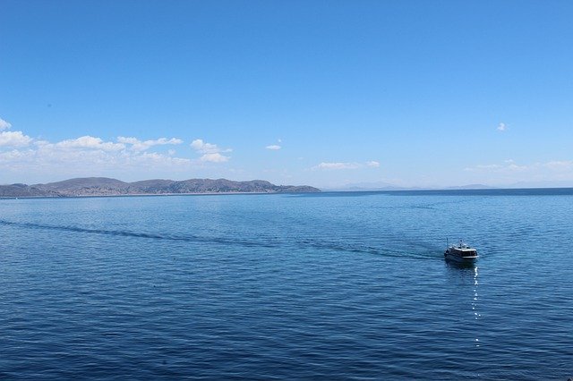 تنزيل مجاني لـ Boat Lake Titicaca - صورة مجانية أو صورة ليتم تحريرها باستخدام محرر الصور عبر الإنترنت GIMP