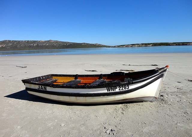 Descărcare gratuită Boat Seaside Lagoon - fotografie sau imagini gratuite pentru a fi editate cu editorul de imagini online GIMP