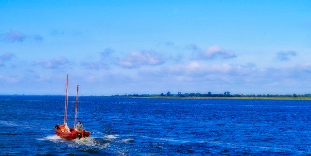 Безкоштовно завантажте Boat Sea Wide - безкоштовне фото або зображення для редагування за допомогою онлайн-редактора зображень GIMP