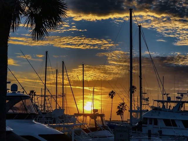 Muat turun percuma Boat Sunset Mast - foto atau gambar percuma untuk diedit dengan editor imej dalam talian GIMP