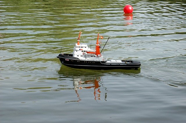 ดาวน์โหลดฟรี Boat Toy Transport - ภาพประกอบฟรีที่จะแก้ไขด้วย GIMP โปรแกรมแก้ไขรูปภาพออนไลน์ฟรี