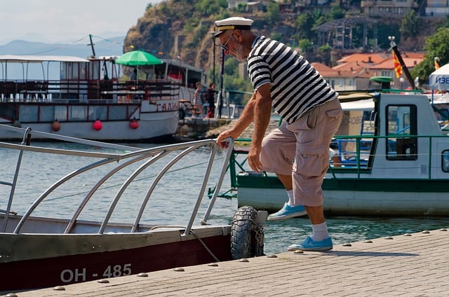 Free download boat vessel man dock captain free picture to be edited with GIMP free online image editor
