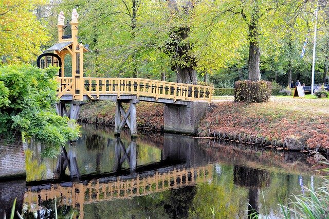 Descărcare gratuită Bridge Park Reflection - fotografie sau imagini gratuite pentru a fi editate cu editorul de imagini online GIMP