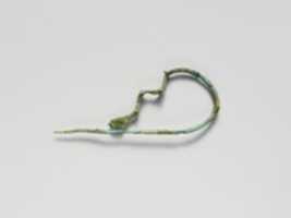 Free download Bronze dragon-type fibula free photo or picture to be edited with GIMP online image editor