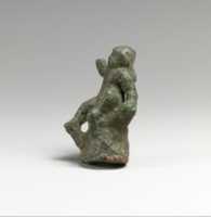 Free download Bronze statuette of Eros seated on a rock free photo or picture to be edited with GIMP online image editor