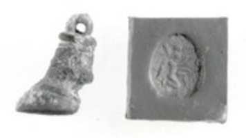 Free download Bulls hoof stamp seal and modern impression: kneeling winged genius free photo or picture to be edited with GIMP online image editor
