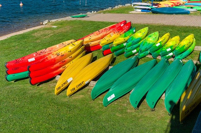 Free download Canoes Water Outdoor -  free photo or picture to be edited with GIMP online image editor