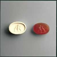 Free download Carnelian intaglio of a gladiator fighting a lion free photo or picture to be edited with GIMP online image editor