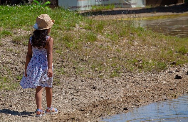 Free picture Child On Pond Shore In Hat -  to be edited by GIMP free image editor by OffiDocs