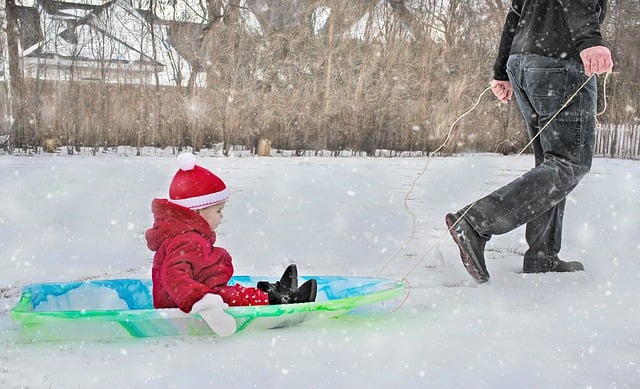 Free download child toddler sledding fun snow free picture to be edited with GIMP free online image editor