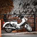 Classic White Honda Motorcycle Parked Outdoor  screen for extension Chrome web store in OffiDocs Chromium
