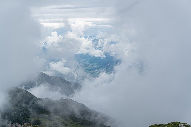 Şablon Fotoğraf Bulutlar Dağlar Inntal - OffiDocs için
