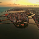 Coastal city and bridges  screen for extension Chrome web store in OffiDocs Chromium