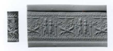 Free download Cylinder seal: weather gods framing heraldic griffins at tree below winged sun disc and ibexes free photo or picture to be edited with GIMP online image editor