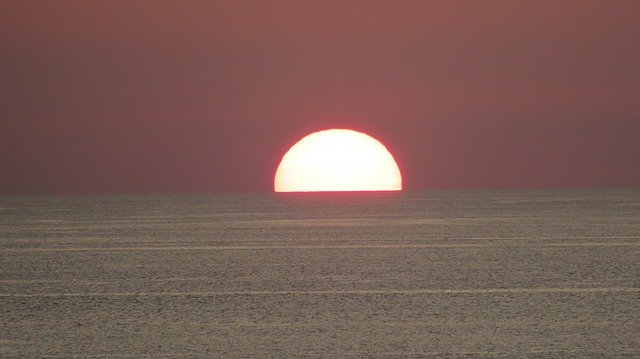 Скачать бесплатно Earth Hour Sun Sea - бесплатное фото или изображение для редактирования с помощью онлайн-редактора изображений GIMP