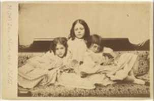 Free download Edith, Ina and Alice Liddell on a Sofa free photo or picture to be edited with GIMP online image editor