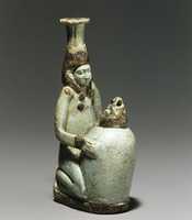 Free download Faience double-spouted vessel in the form of a kneeling woman holding a jar free photo or picture to be edited with GIMP online image editor