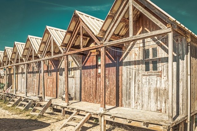 Безкоштовно завантажте безкоштовний фотошаблон Fisher Hut Wooden Sea для редагування в онлайн-редакторі зображень GIMP