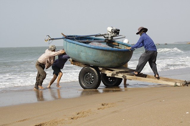 Free download Fishermans Carrying Basket Boat -  free photo or picture to be edited with GIMP online image editor